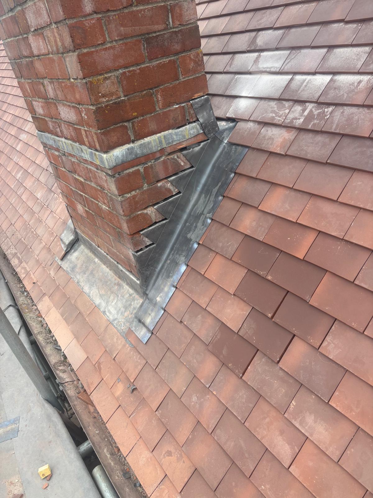 Close-up of Code 4 lead flashing on a chimney